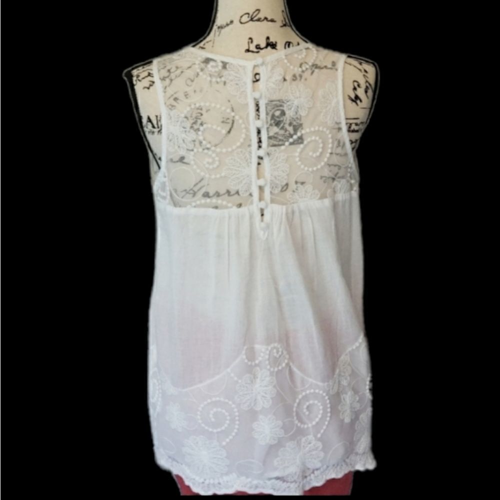 Beautiful embroidered white tank